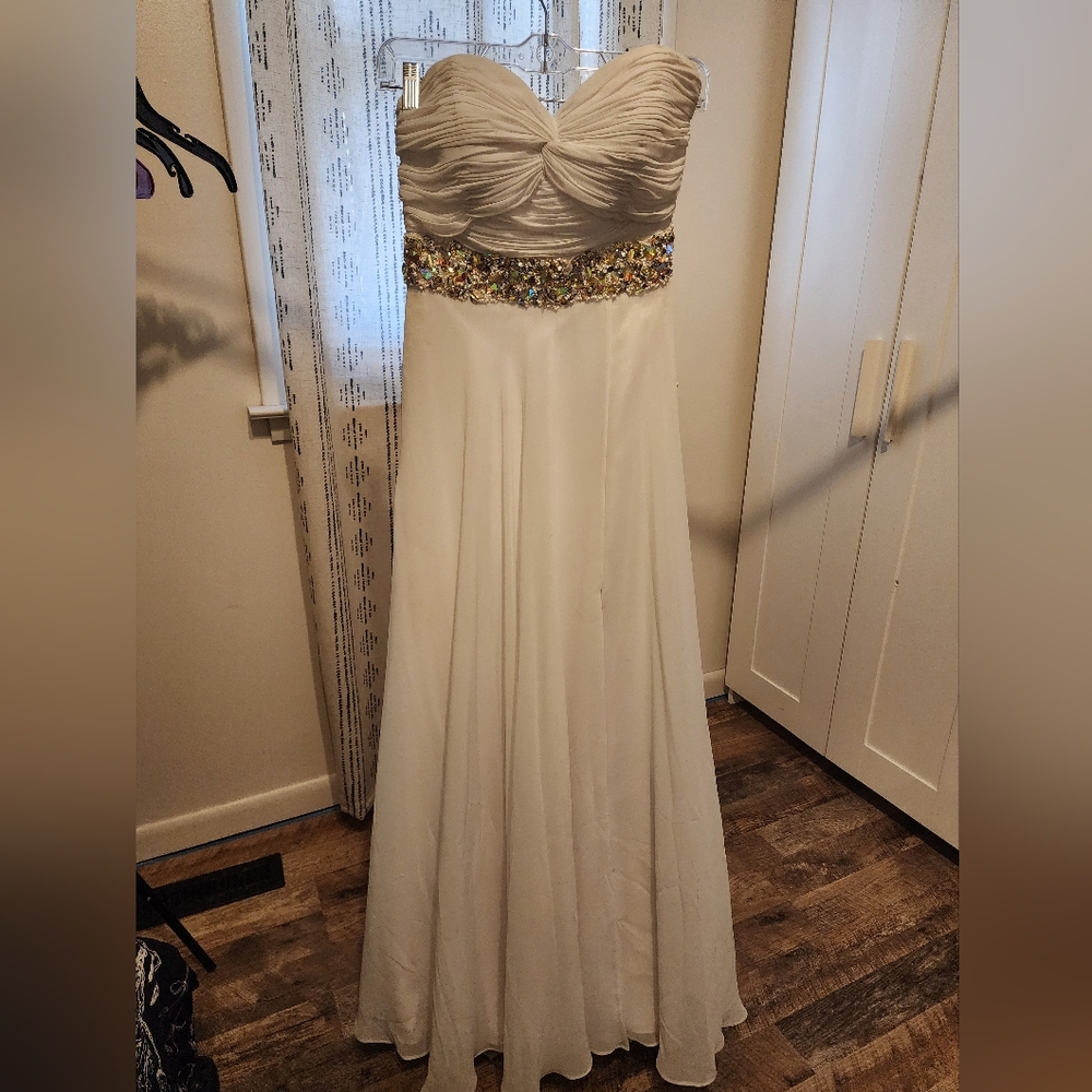 Elegant White Gown with Embellished Waist